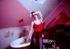 RED HOT Woman Holding Bathtub