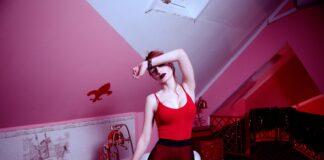 RED HOT Woman Holding Bathtub